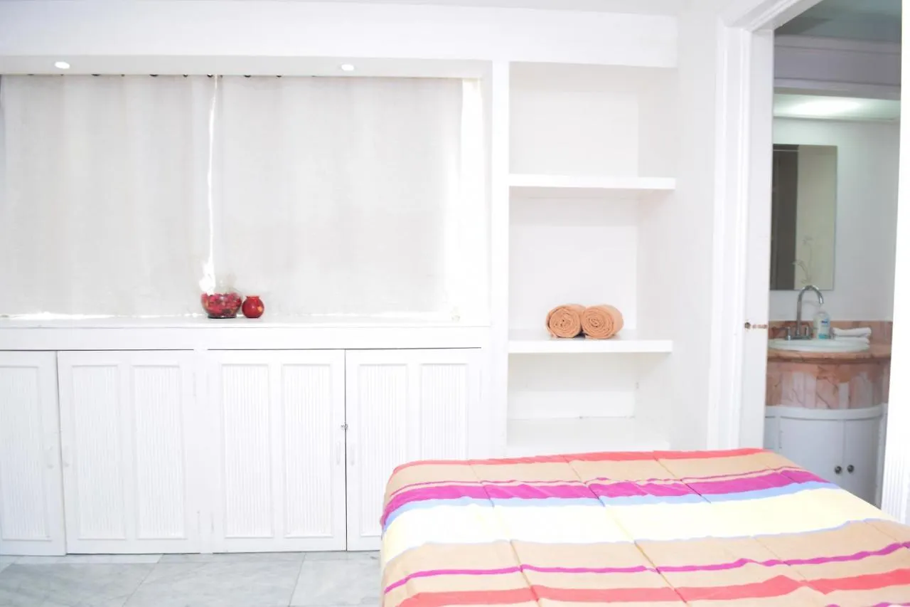 Departamento Sobre La Playa Канкун Апартаменты